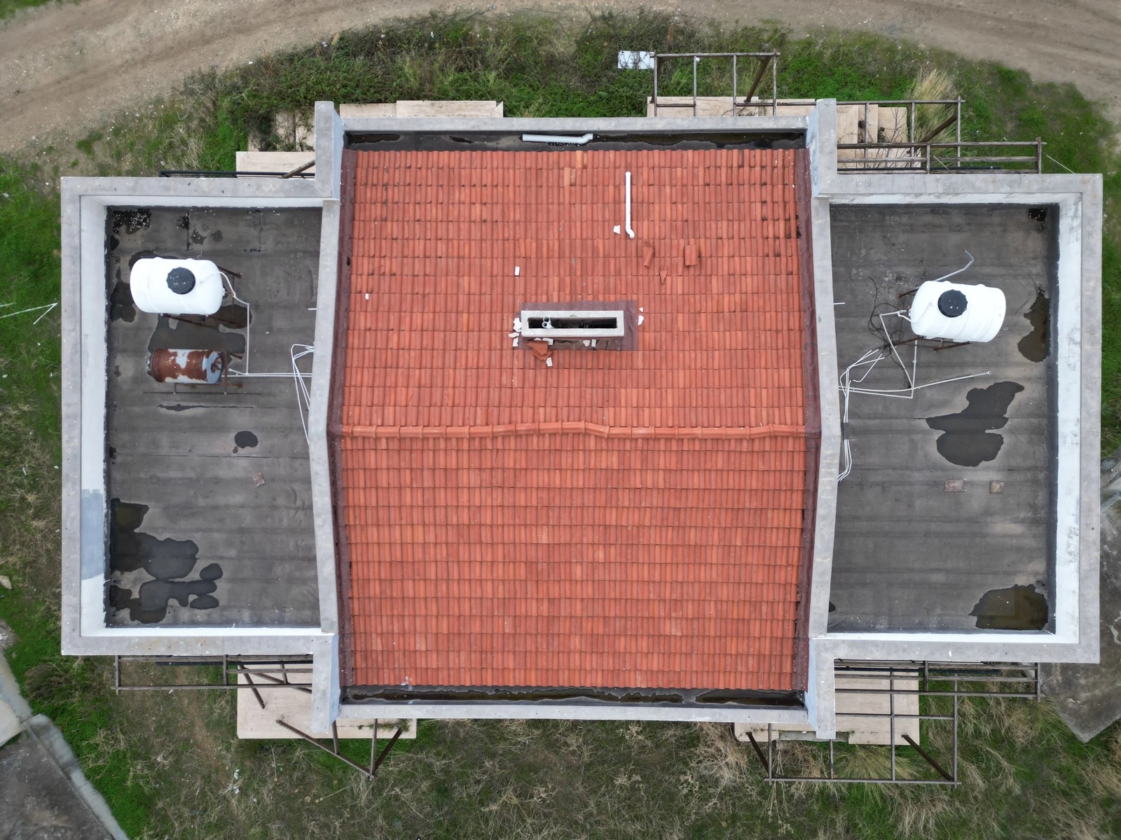 Aerial view of a completed Cyprus residence with red-tiled roof