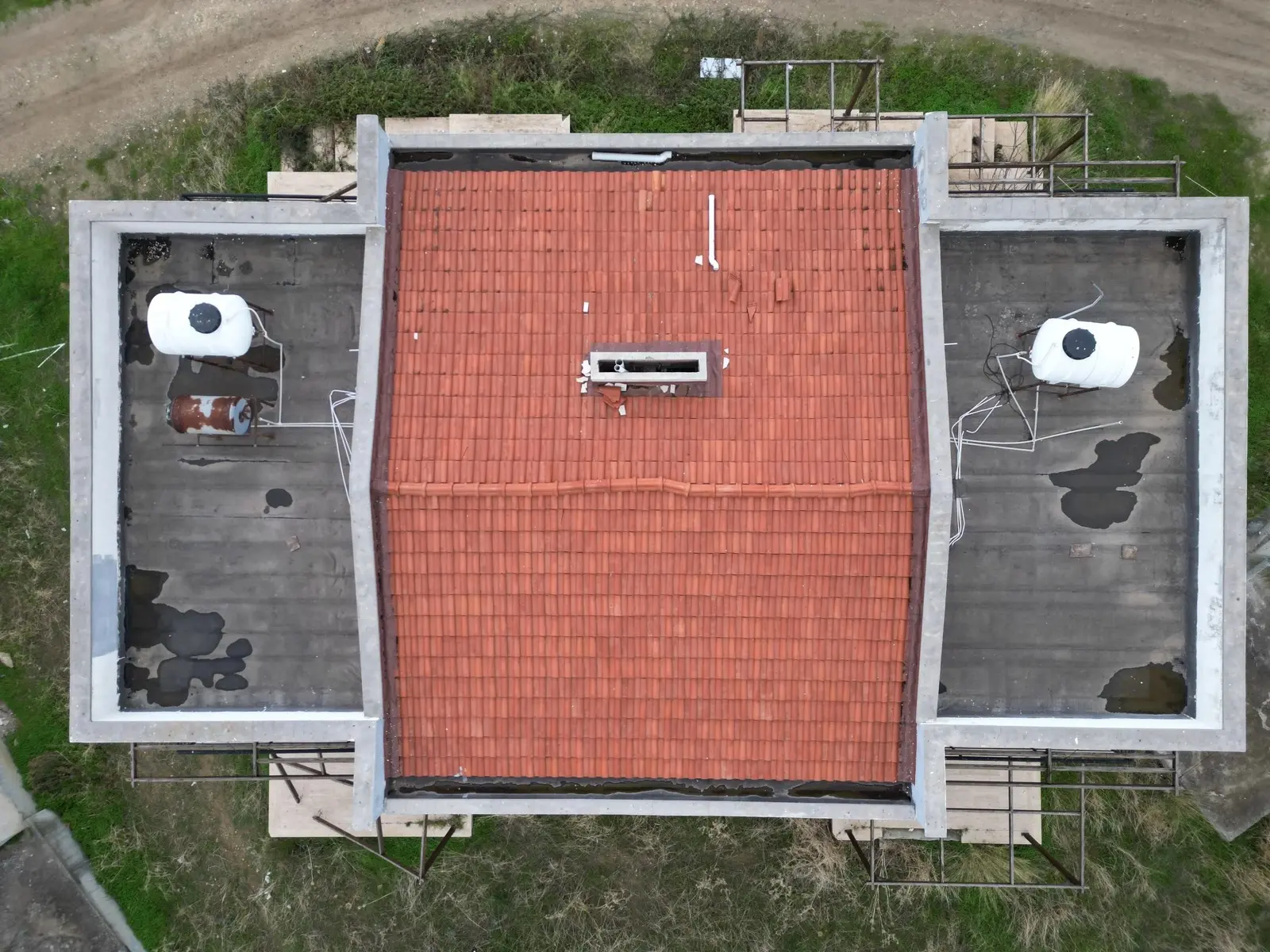 Aerial view of a completed Cyprus residence with red-tiled roof