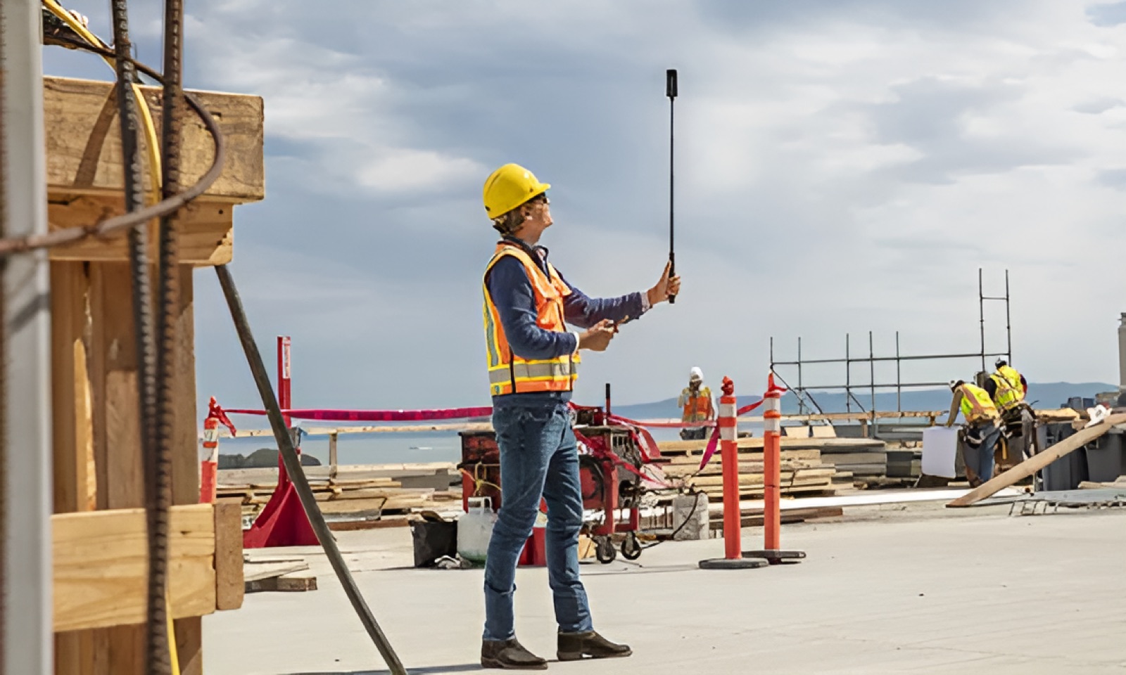 Worker capturing 360° walkthrough on a Cyprus construction site