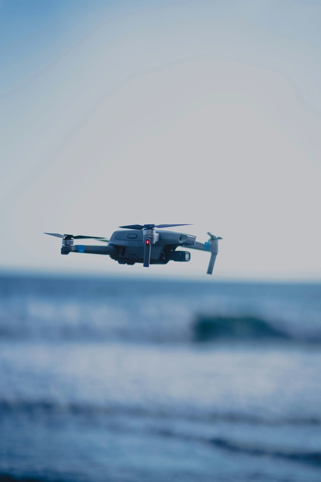 Drone flying over the Cyprus coastline at sunset