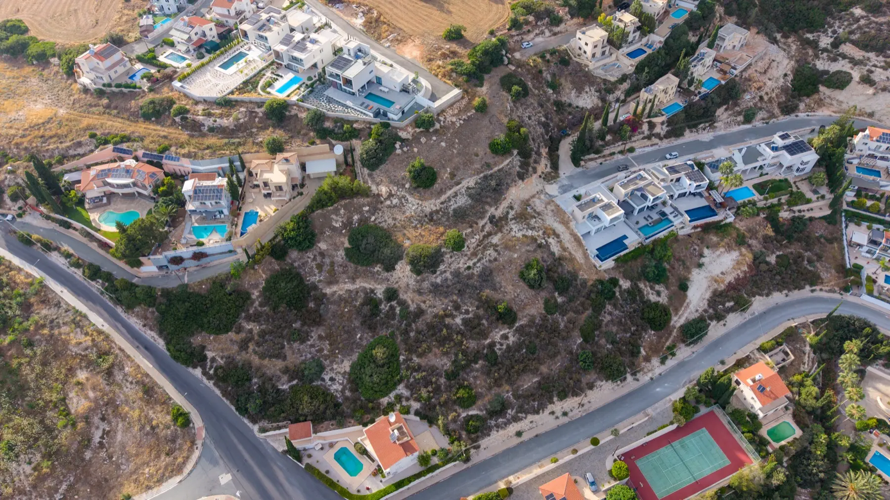 Breathtaking aerial drone photograph of a Cyprus hillside land plot and surrounding terrain