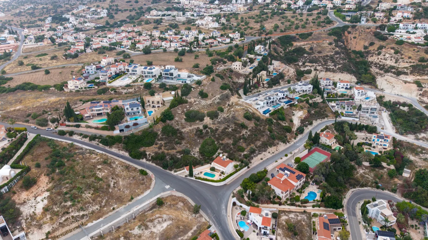 Wide aerial drone photograph of a Cyprus development plot from above